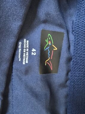 Greg Norman Polo Short - Navy with Multicolor Shark Logo